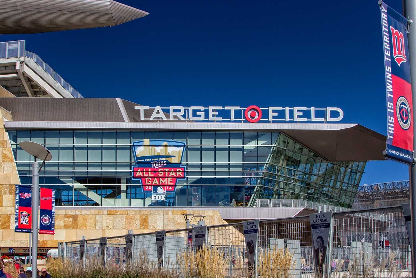 Target Field’s exterior in Minneapolis showcases large signage and a vibrant banner for the 2014 MLB All-Star Game.